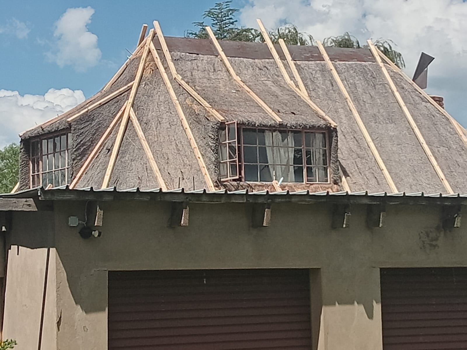 Thatch roof prepared for replacement