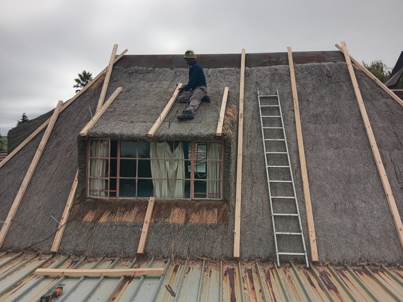 Roof renewal work around a dormer window